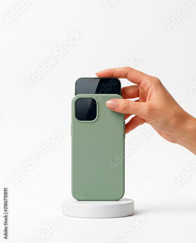 Hand Fitting Sage Green Silicone Case on Smartphone on Podium Mockup
