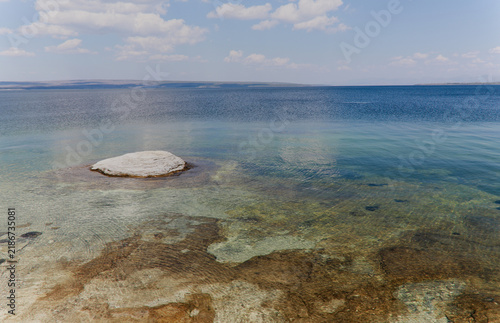 Canvastavla White geyserite formations on the lakeshore of Yellowstone Lake