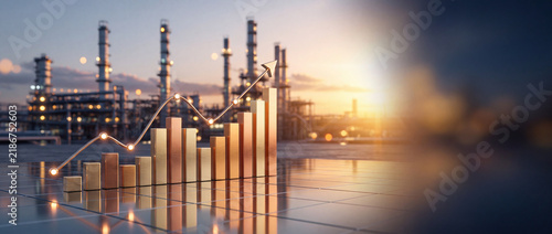 Golden financial bar chart and rising arrow graph over industrial oil refinery at sunset, representing economic growth, energy sector profits, and successful business investment strategy.
