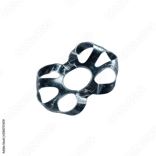 Worn, crumpled translucent plastic six-pack ring with scratches, macro against a pure black background, dramatic rim lighting, somber blue tones, severe environmental hazard concept