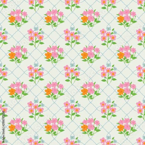 Seamless floral pattern with cute pink and orange flower bouquets on a soft trellis background