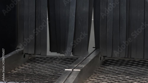 An airport luggage belt with suitcases. Baggage carousel or luggage carousel.