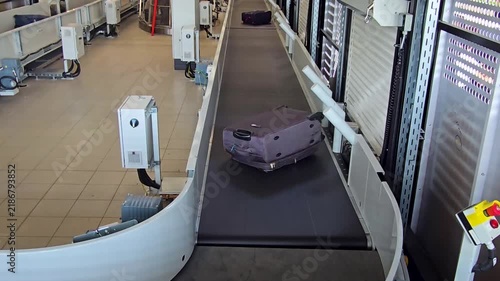 An airport luggage belt. Baggage carousel or luggage carousel.