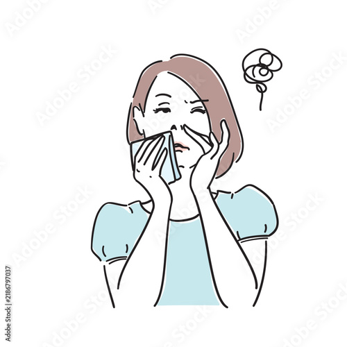 鼻が詰まっている女性　風邪花粉症の症状