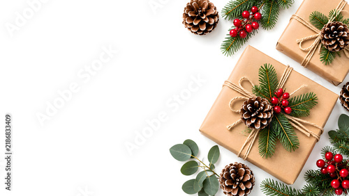 Christmas Gift Boxes with Pine Cones and Red Berries on White Background