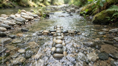 Stone Cross Symbol in Flowing River Nature Scene.