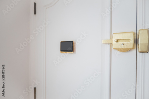 Smart door lock and digital control in modern apartment