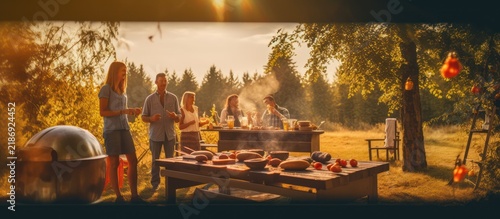 Summer barbecue party with family and friends enjoying food and drinks outdoors in a sunny garden.