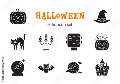Halloween solid icon set. Vector illustration of black spooky elements including pumpkin, witch hat, cat, candelabra, frankenstein, candy bucket, crystal ball, bat, moon and haunted house.