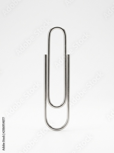 Single silver metal paper isolated on white background with office supply