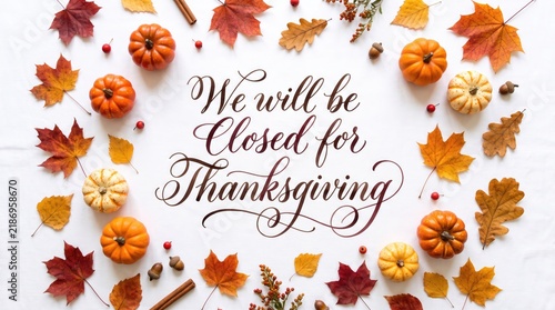 Thanksgiving holiday closure announcement featuring decorative pumpkins and colorful autumn leaves arranged in a beautiful flat lay composition