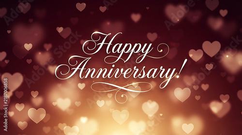 Elegant happy anniversary greeting card design with glowing golden bokeh hearts on a dark background