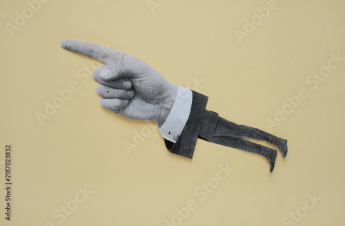 Cuadro en lienzo Businessman cutout body dynamically leaning with pointing finger hand on yellow