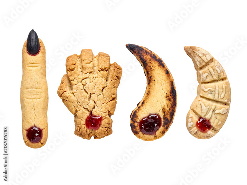 Bild auf Leinwand Creepy Halloween cookies: severed fingers, monster claws, and hands with red jam 'blood' for a party