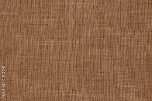 Dark brown linen fabric texture background, seamless pattern of natural textile.