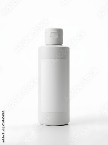 White Lotion Bottle on Display for Skincare or Cosmetic Use