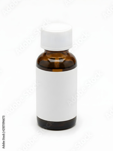 Amber glass bottle with white cap on white background for medicine or supplement