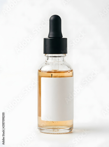 Glass serum bottle with dropper for skincare and beauty products