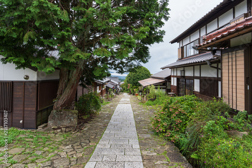 Long pathway on Nakasendo walking trail through Magome-Juku in Gifu, Japan