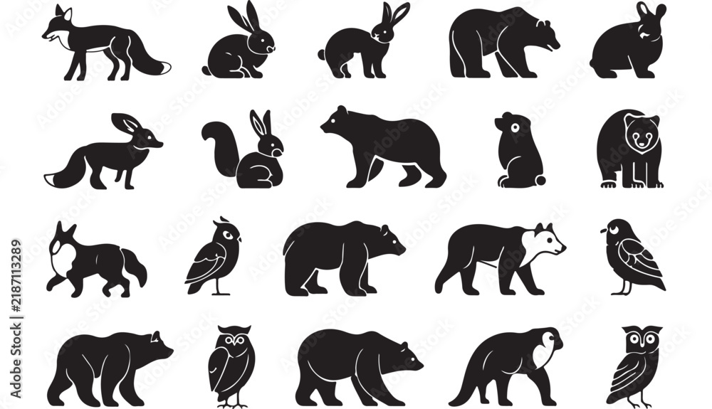 Fototapeta premium Collection of minimalist black and white vector animal silhouettes depicting various forest creatures like bears foxes owls and rabbits isolated