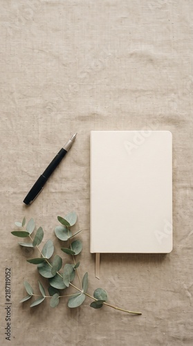 Minimalist workspace with pen and notebook