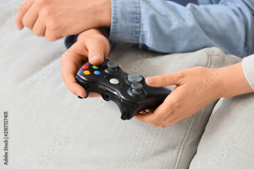 Obraz na płótnie Gaming and entertainment, friends playing video games together with a controller