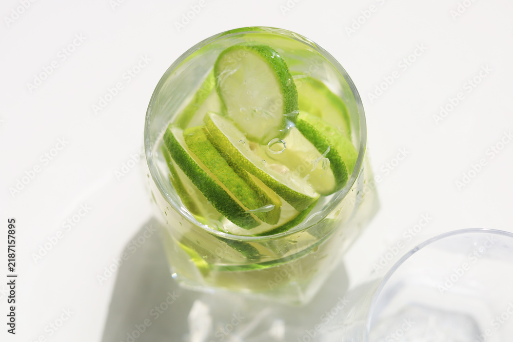 Fototapeta premium Fresh lime infused water in glass.