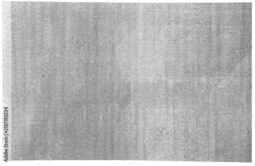 Vintage gray paper texture with vertical grain lines and torn edge, faded document surface for retro design and creative print project