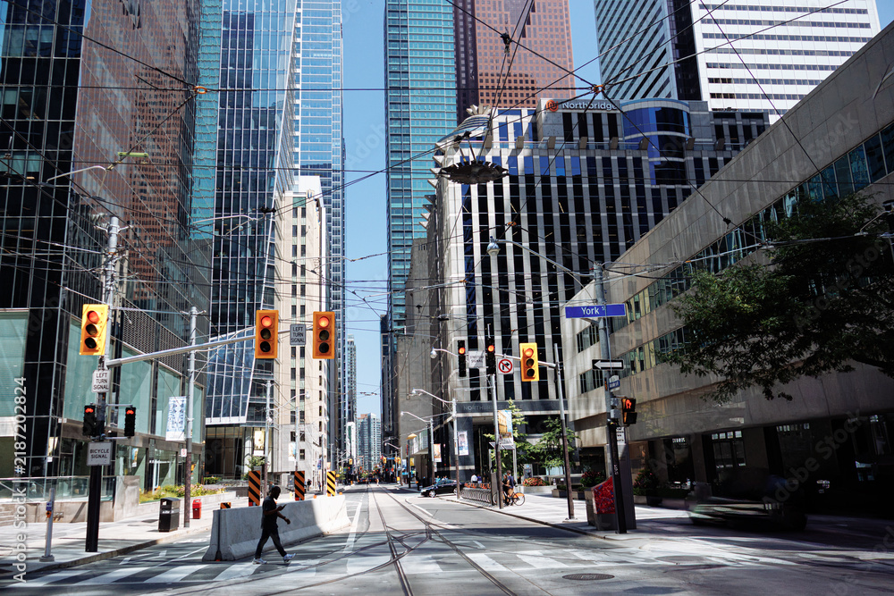 Obraz premium 12th of July 2026 Toronto, Canada, excursion on busy street scene with Union Station and CN Tower in downtown Toronto