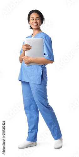 Female African-American medical student with laptop on white background