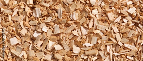 Close range pile of wood chips under soft daylight