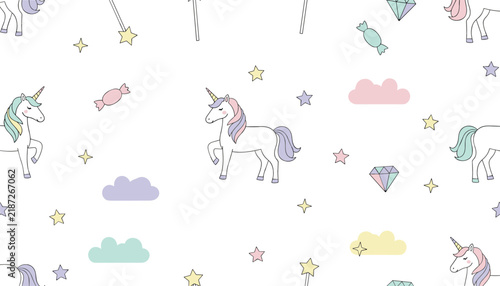 Whimsical seamless pattern with cute cartoon unicorns, magic wands, pastel clouds, candies, and glittering stars.