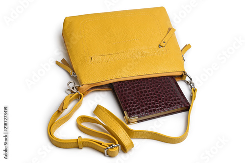 Tapety artystyczne Yellow leather handbag with diary for notes
