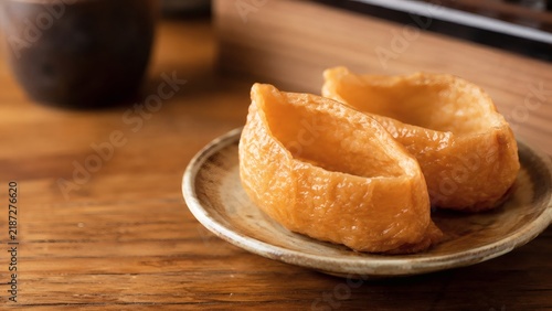 Golden Inari Sushi on Rustic Wooden Table