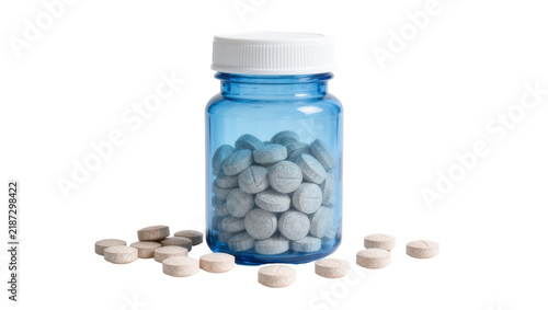 Obraz na plátně Blue plastic pill bottle filled with gray tablets, scattered pills isolated on t