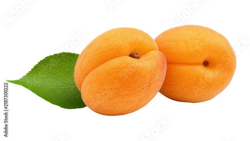 Bild auf Leinwand Two ripe orange apricots with a green leaf, isolated on transparent background