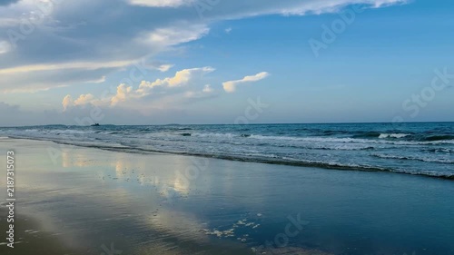 Peaceful blue ocean horizon background on a bright sunny day
