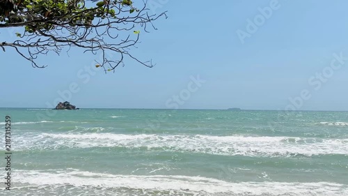 Peaceful blue ocean horizon background on a bright sunny day
