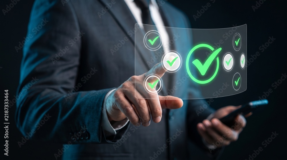 Obraz premium Businessman With Holographic Green Checkmark Interface, Tech Concept, Mobile Device Control, Success, Approval