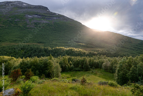 A beautiful summer mountain valley landscape near Norddal vilage. A seasonal scenery of World Heritage area in Western Norway.