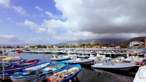 Boats and motorboats in the harbor of Mondello, Sicily, Italy