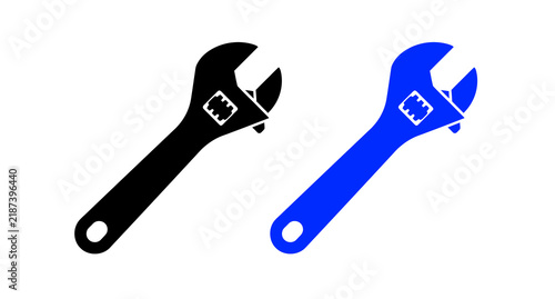 Cuadro en lienzo Two adjustable wrenches in black and blue silhouette against a white background