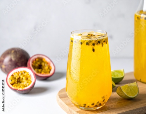 Refreshing Sparkling Passion Fruit Beverage with Fresh Lime for Summer Advertising