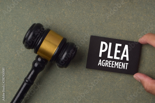 Quadro su tela Legal concept featuring a judge's gavel and a card labeled Plea Agreement, representing criminal law, court proceedings, legal negotiation, and judicial decision making