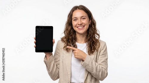 Smiling Woman Points to Tablet Screen