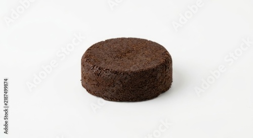 Used circular compressed coffee puck.