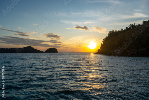 Bild auf Leinwand Sunset over Bolilanga Island, Togian archipelago, Sulawesi, Indonesia