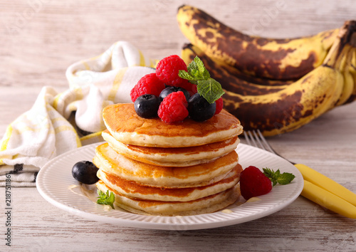 Overripe banana pancakes with berries