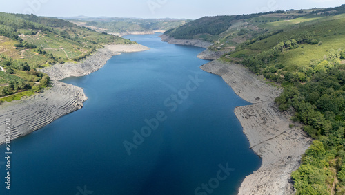 Belesar reservoir showing low water levels in Galicia, Spain