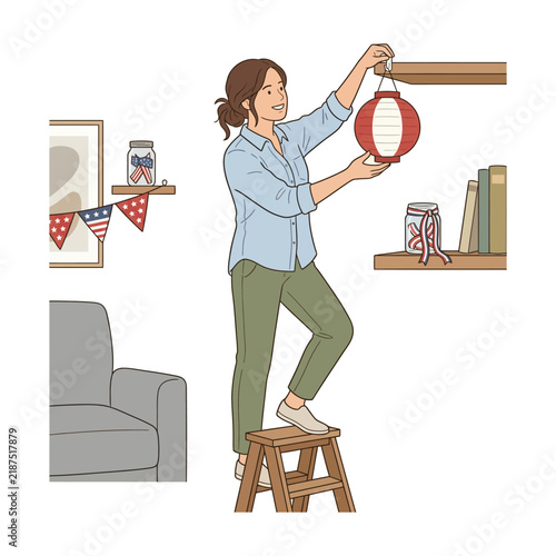 Young Woman Decorating Living Room with Festive Paper Lanterns and Patriotic Bunting on a Stepladder for Holiday Celebration